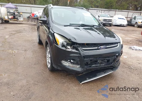 2015 Ford Escape Titanium z USA, uszkodzony, nr VIN 1FMCU0J99FUB12324